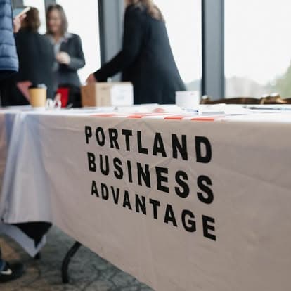 The Portland Business Advantage registration table